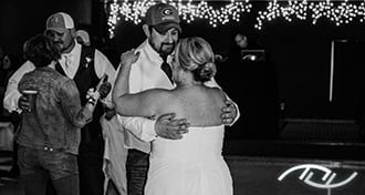 John & Cheri dancing to a slow country song with their friends at the Stover Community Center in Stover, MO. (Photo Credit: Amber Koelling Photography)